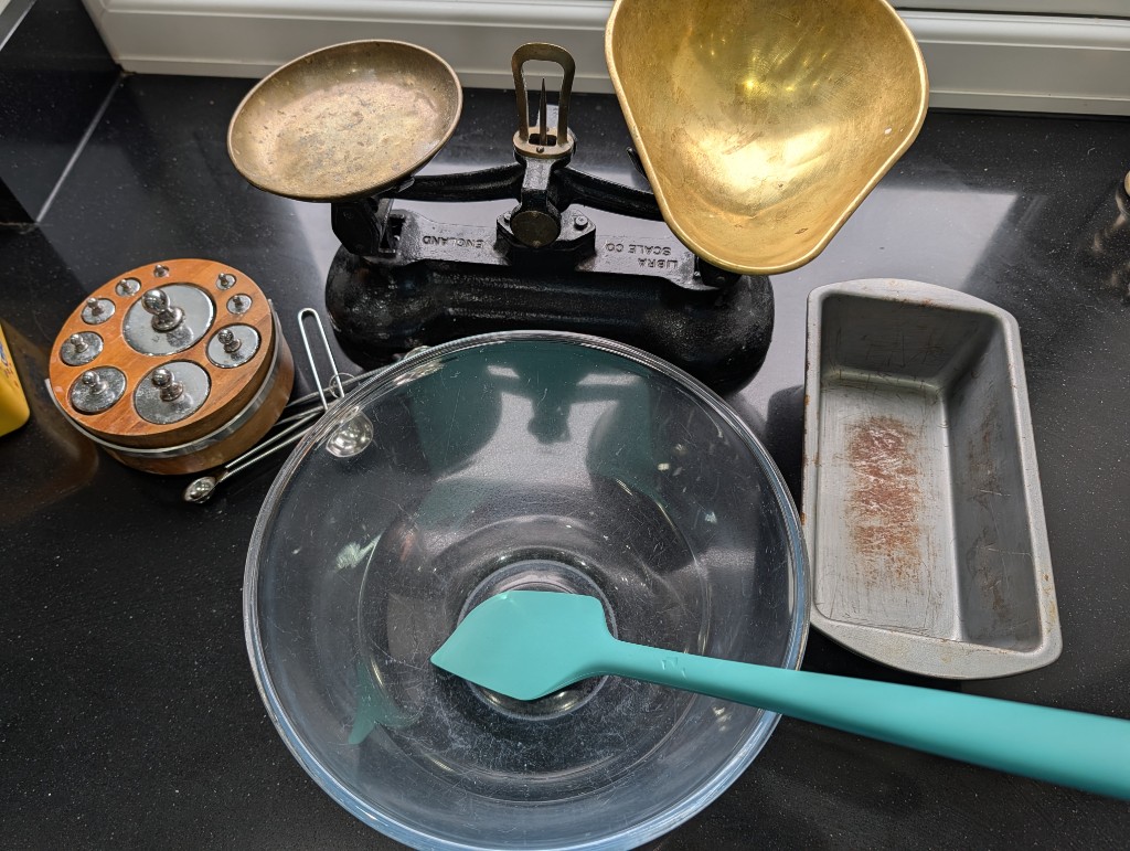 Tin, bowl, scales, and zester ready