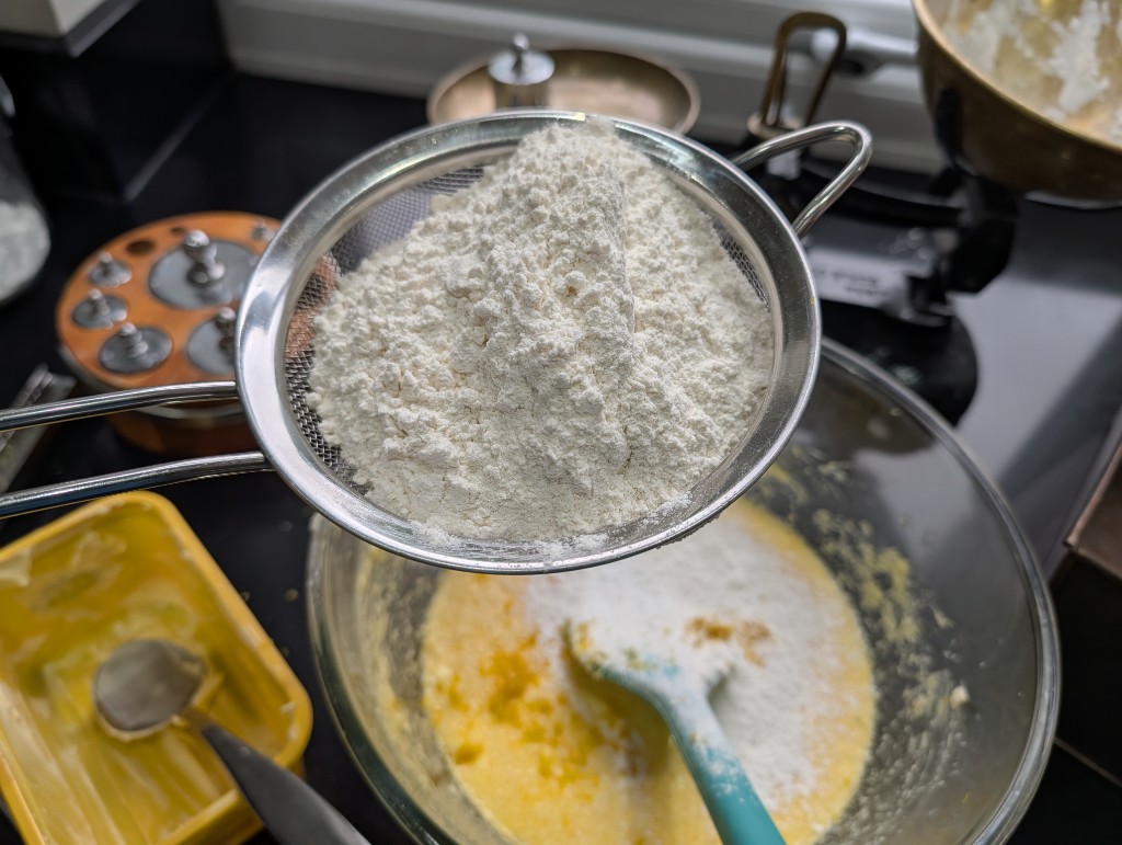 Sifting in the flour and baking powder