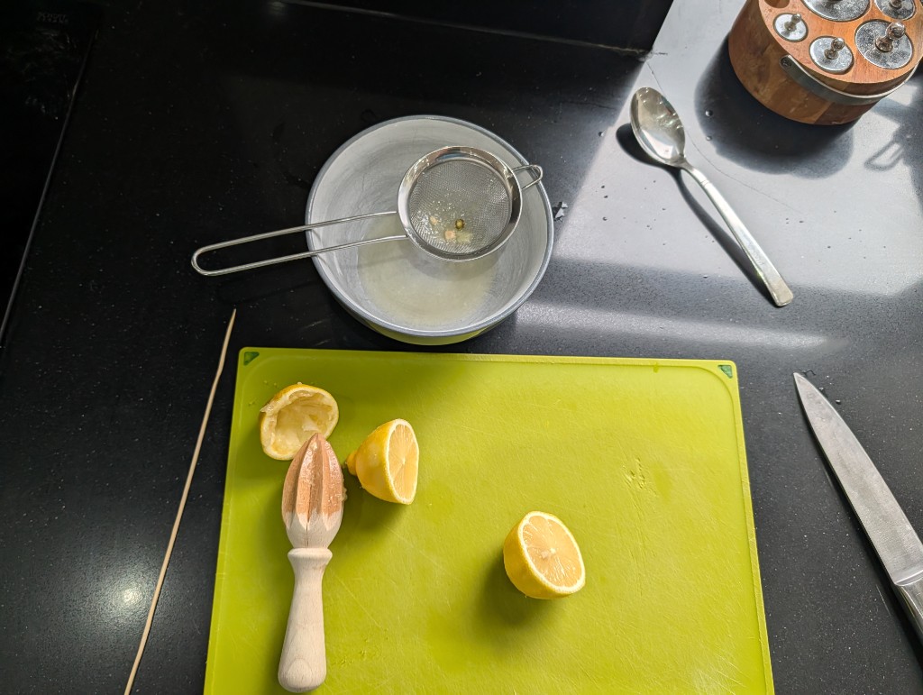 Juicing the lemons for the drizzle